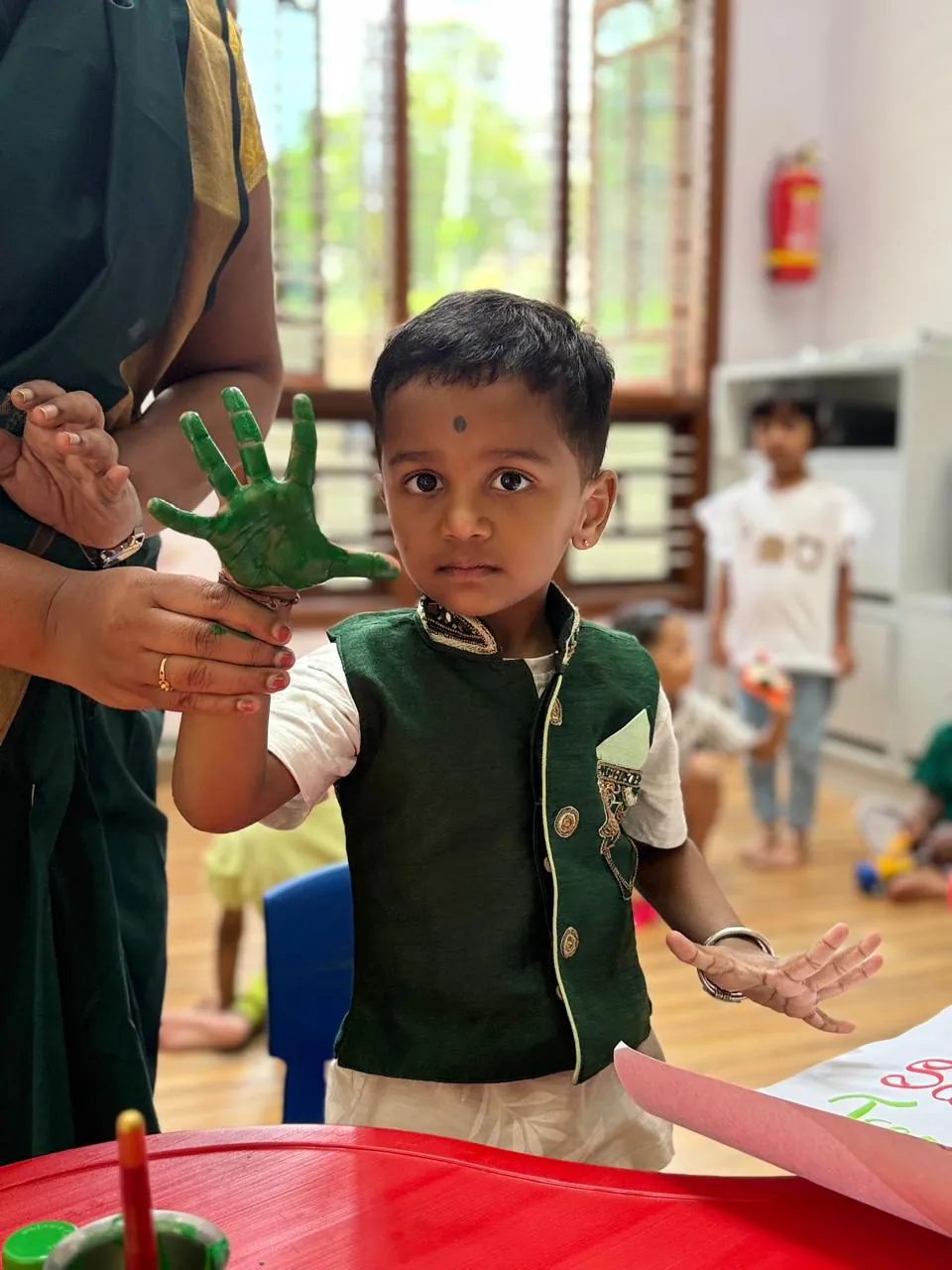 Children creating art in FlyHigh Pre School's creative classroom