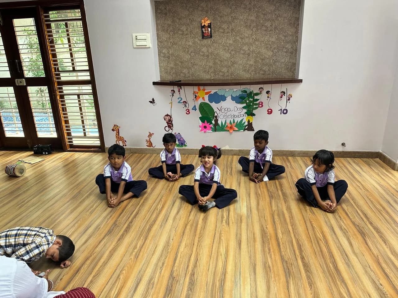 Children practising yoga